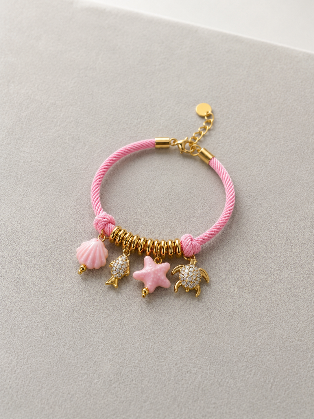 PULSERA CON CHARMS MARINOS DE CERÁMICA