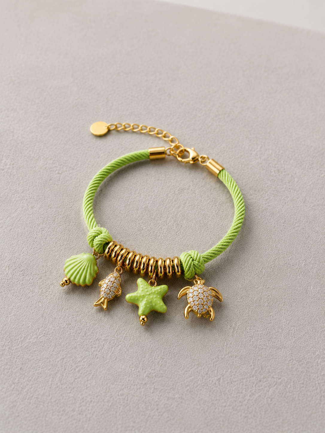 PULSERA CON CHARMS MARINOS DE CERÁMICA