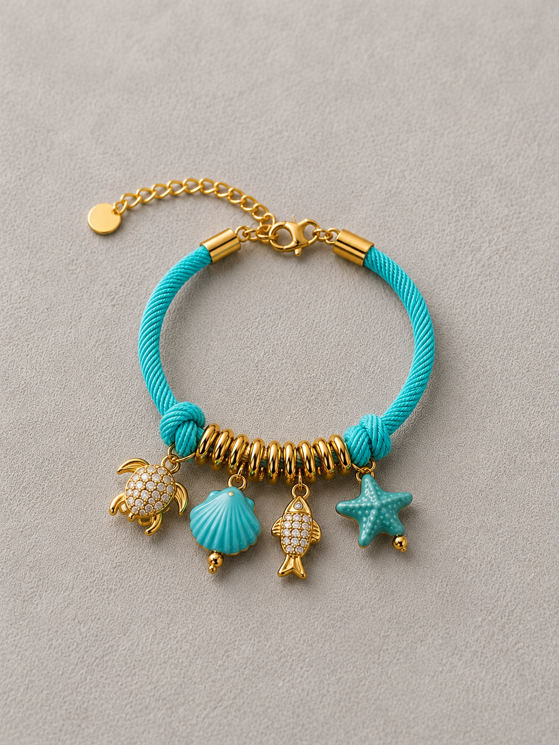 PULSERA CON CHARMS MARINOS DE CERÁMICA