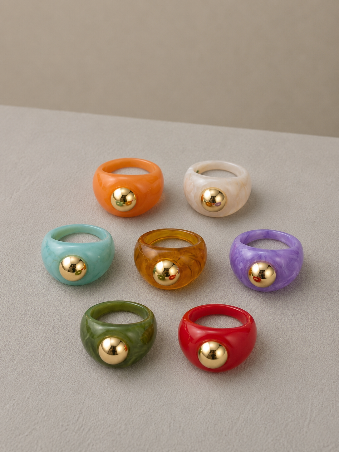 ANILLO RESINA BOLA DORADA
